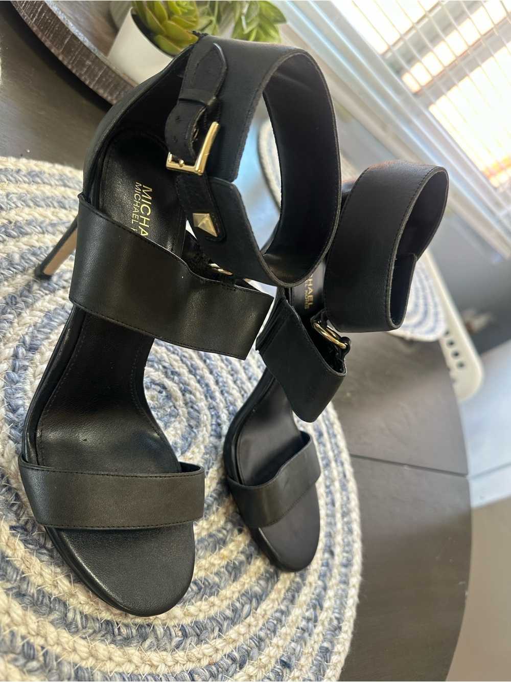 MICHAEL Michael Kors Black Leather Strappy Stiletto Heels with Gold-Tone Buckles
